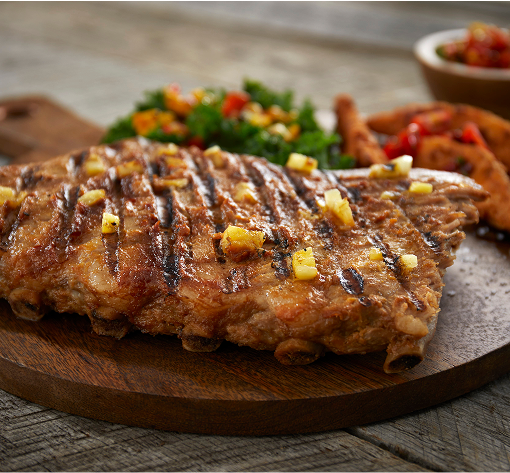 Pork ribs topped with pineapple sriracha