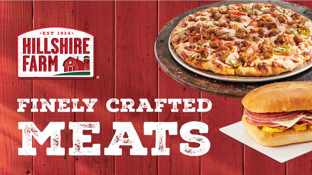 pizza topped with Hillshire Farm® brand products and sandwich on a red barn background that features the Hillshire Farm® brand logo and text FINELY CRAFTED MEATS