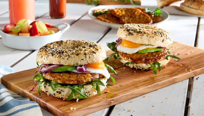 A breakfast bagel sandwich featuring a Jimmy Dean® Chicken Breakfast Sausage Patty