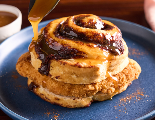 Chipotle Cinnamon Chicken Breakfast Sandwich with a breaded breast filet, chipotle cinnamon sugar seasoning and caramel syrup