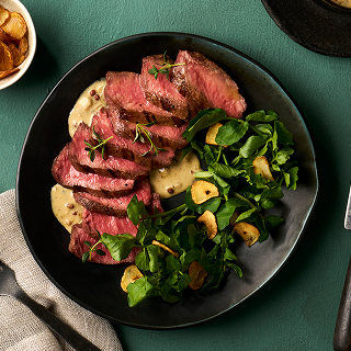 Sliced Steak with a side salad