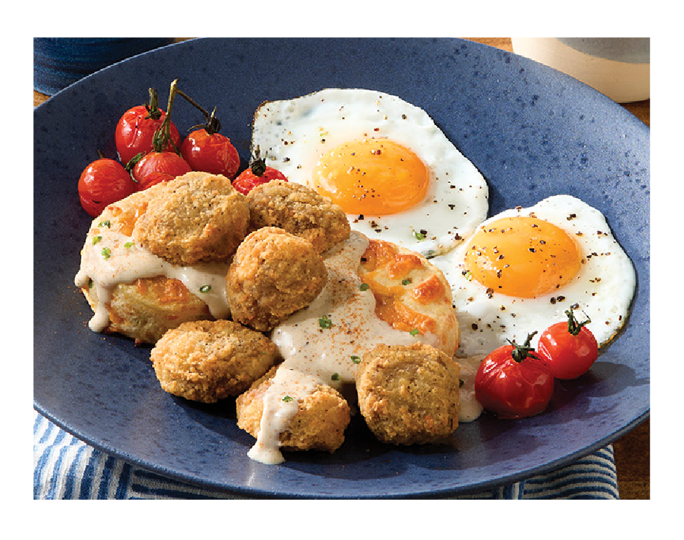 Beef bites with southern black gravy, biscuits, and eggs