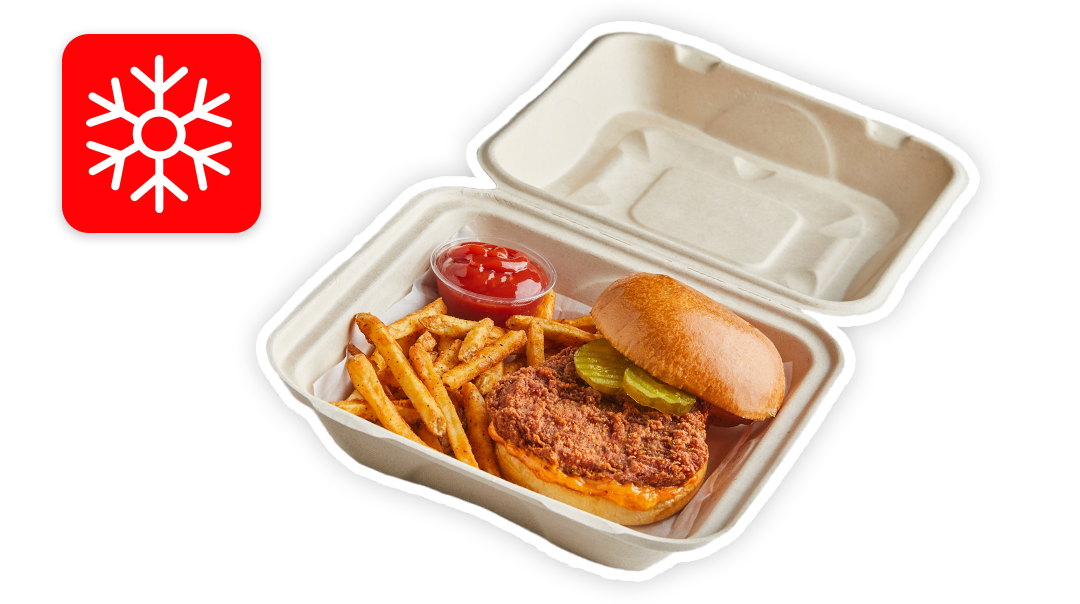 Chicken sandwich and fries meal in a takeout box with a red snowflake icon in the top left corner