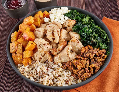  Chicken Bowl with wild rice, farro, chai-spiced butternut squash, roasted kale, and Tyson grilled chicken strips topped with goat cheese and walnuts