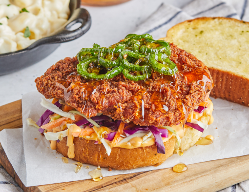 Honey Jalapeño Chicken Sandwich on a wood serving platter