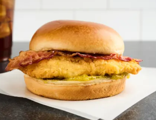 Swicy Chicken Bacon Sandwich on parchment papaer