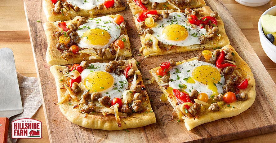 Sunny side up breakfast sausage pizza