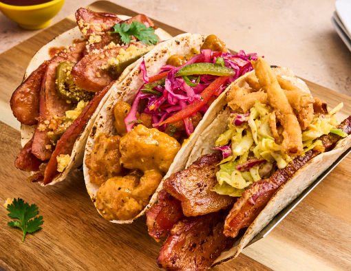 Taco Flight on a Board With Side Sauces