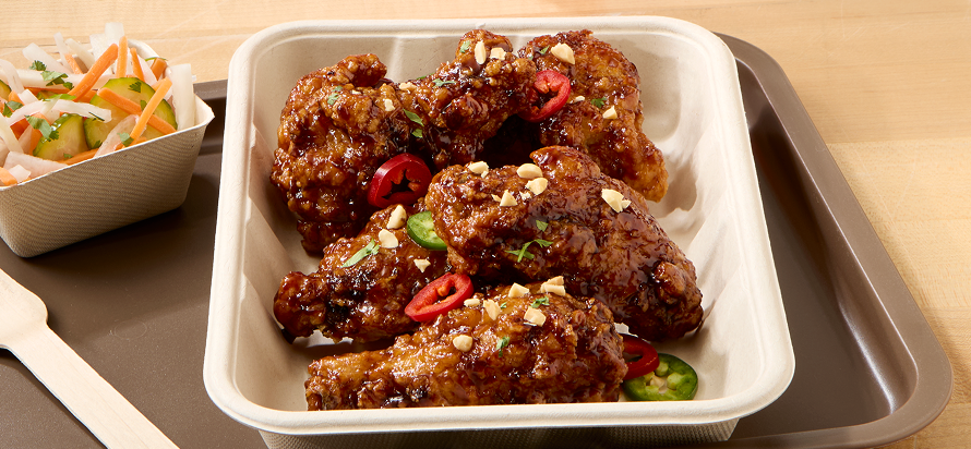 Tyson® Fully Cooked Breaded Crispy Battered Bone-In Chicken Wing Sections, Jumbo in restaurant setting