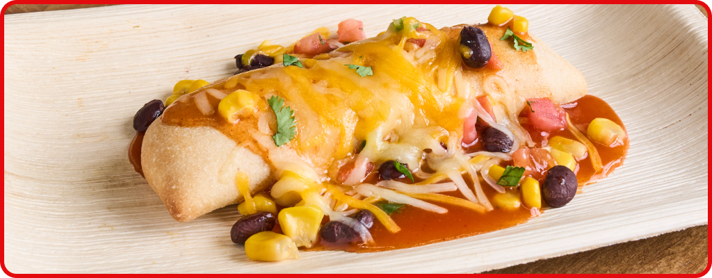 Tortilla topped with Mexican style beans, corn, and cheese