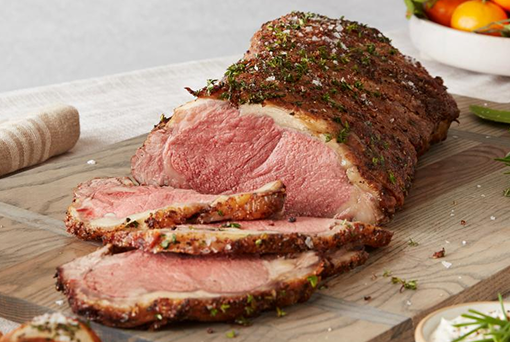seasoned beef product on cutting board