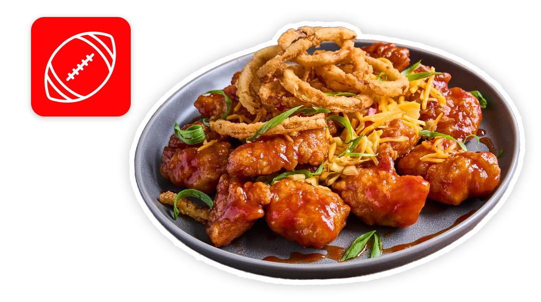 Whiskey BBQ glazed boneless wings topped with onions