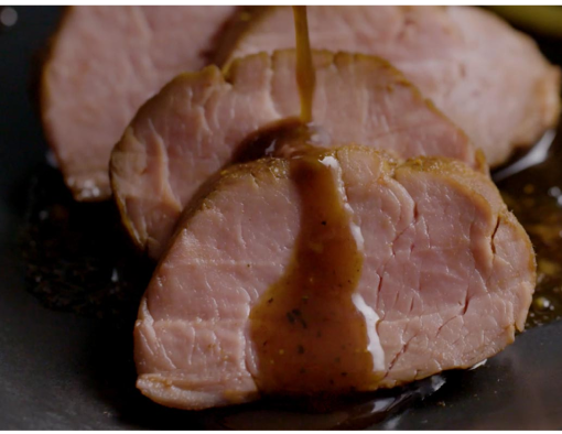 Pan Seared and Sliced Glazed Pork Tenderloin on a Plate