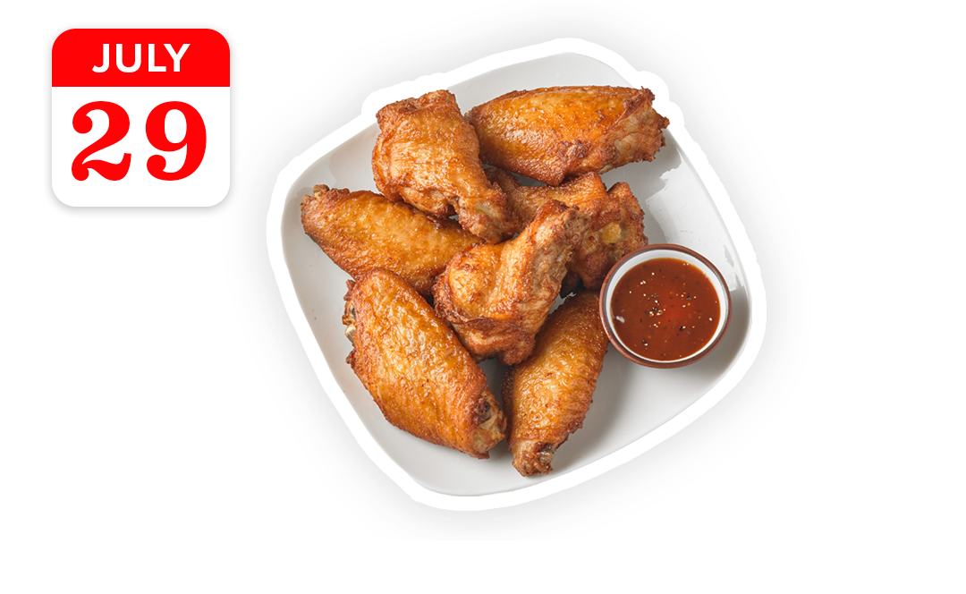 wings and sauce in serving setting