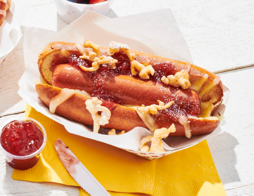 Monte Cristo Dog topped with swiss cheese and strawberry jam