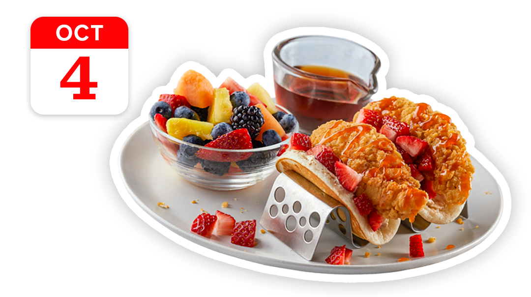 Pancake tacos with fried chicken and strawberries, served with a fruit salad, with a calendar icon for 'OCT 4'