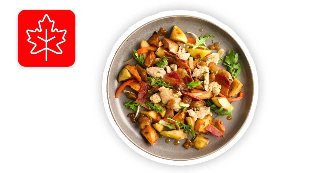 Chicken and bacon salad with a leaf icon in the top left corner