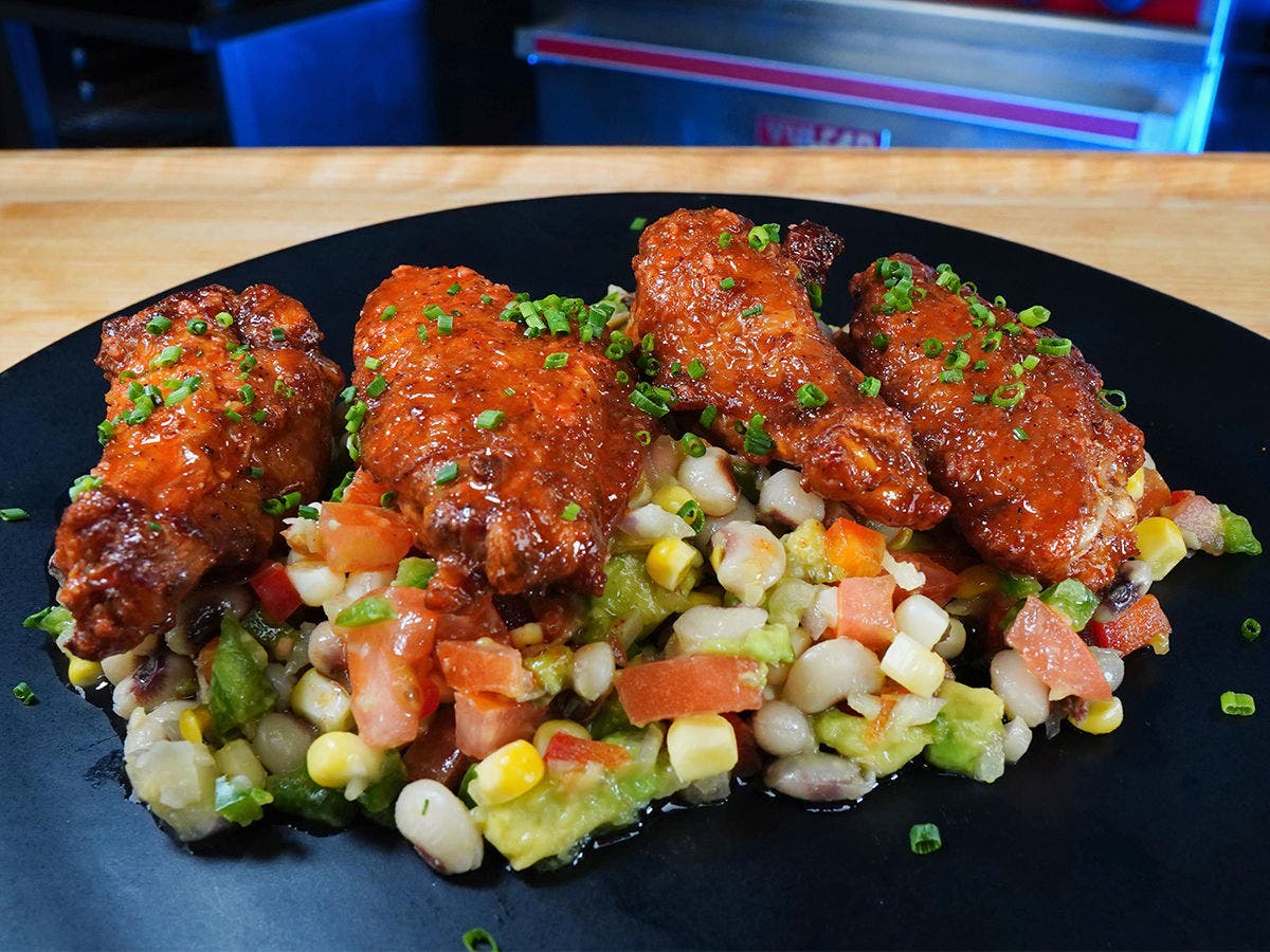 Image of Pollo Asada Wings With Cowboy Caviar Recipe.