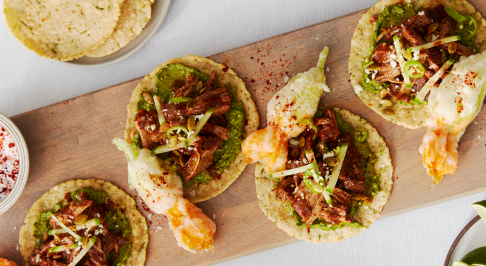 pork butt tacos on a cutting board