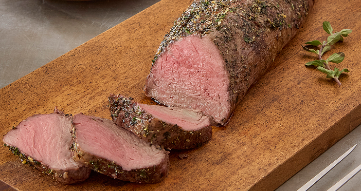 Cooked steak cut into slices