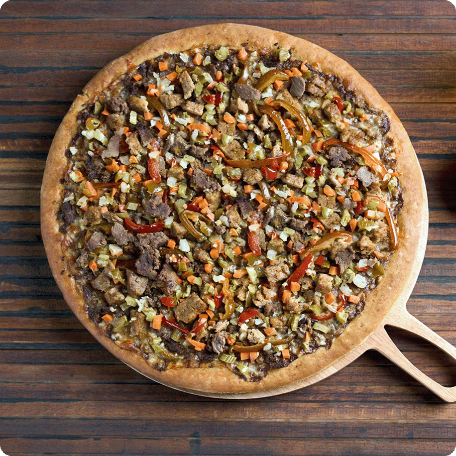 Pizza topped with steak and pepper slices