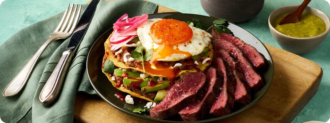 plated Sunrise Steak Tostada Stacker menu item