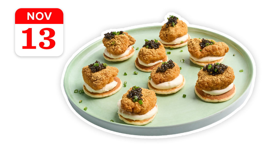 A plate of mini pancakes with fried chicken, cream, caviar, and chives. Calendar icon shows 'NOV 13'