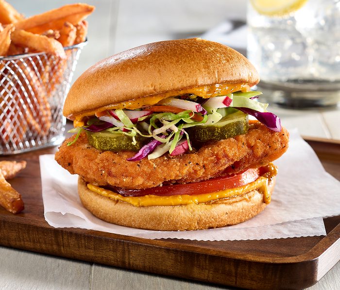 chicken sandwich, sides and a beverage