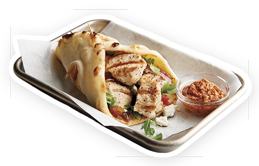 Grilled chicken breast chunks wrapped in a naan