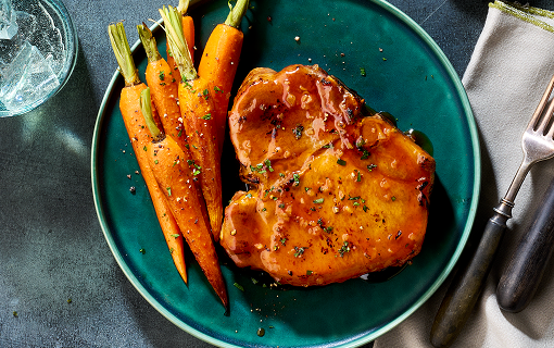 Bone-in short rib with a side of carrots