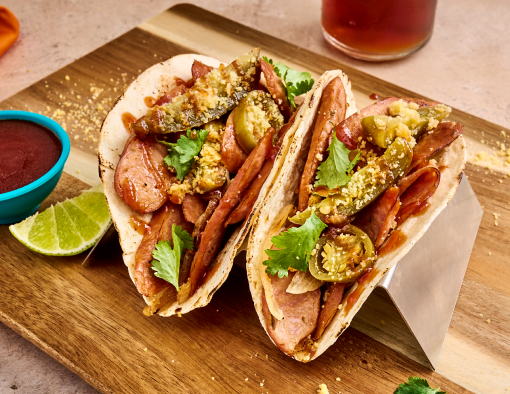 Texas BBQ Smoked Sausage Tacos on a cutting board