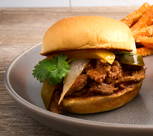 a gray plate on a wood surface with a slider on it