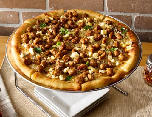 Spicy Italian-Style Sausage, crumbled feta, mozzarella, chili flakes, hot honey drizzle, then finished with fresh basil