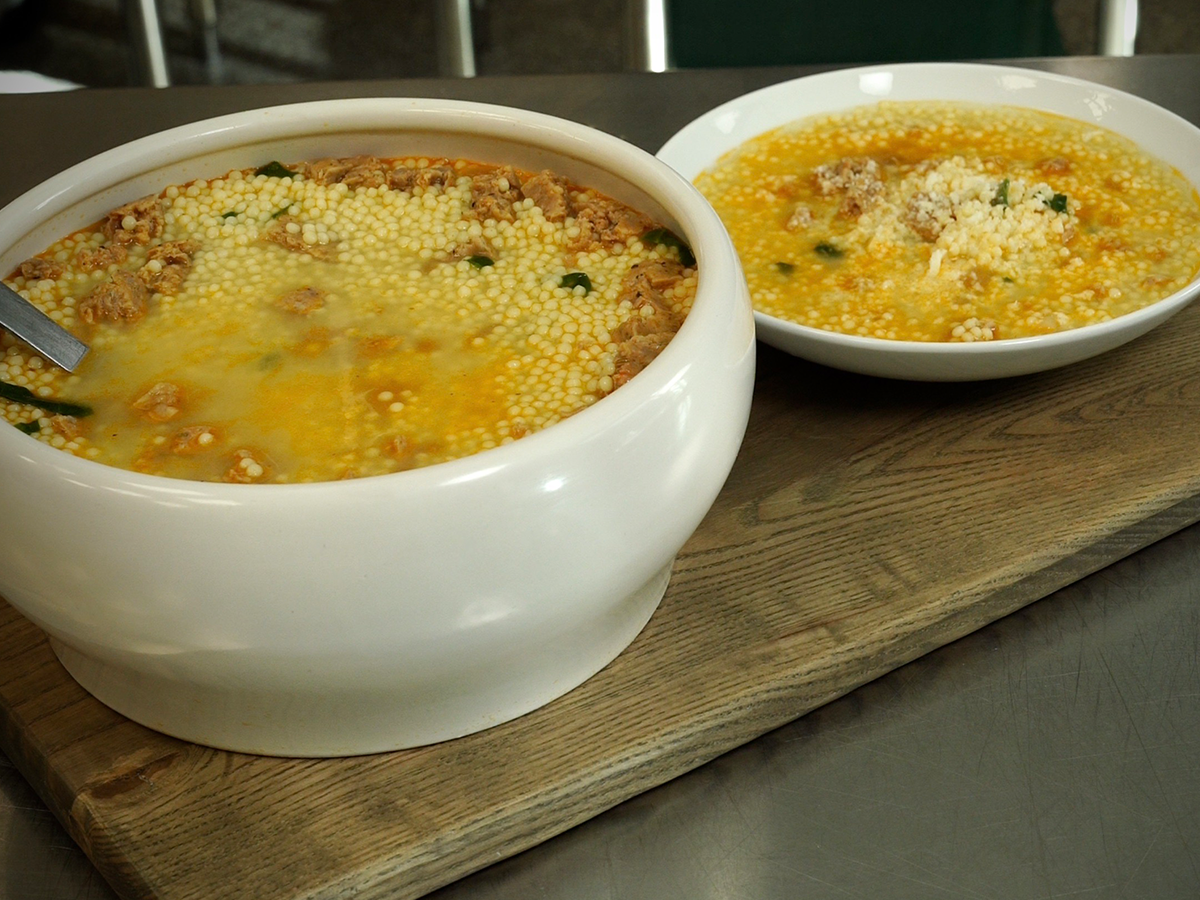 A delicious and old school homestyle wedding soup with Italian Sausage, fresh spinach, pearl pasta and a rich roasted chicken stock. 