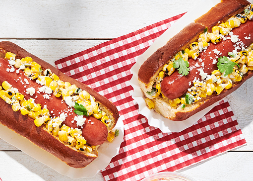Hot dog topped with mexican street corn