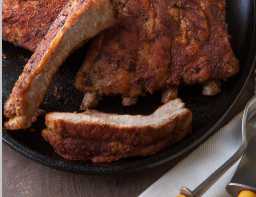 Spicy smoked st.louis-style spareribs on a plate