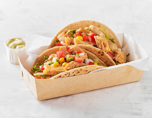 Two tacos stuffed with pulled chicken, Pico de Gallo, Spanish-style rice with side of sauce 