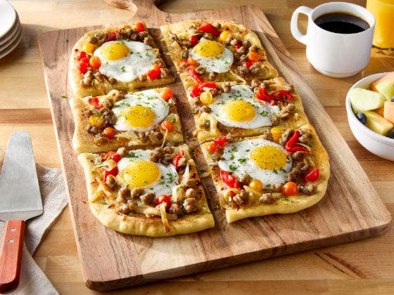 Sunny side up breakfast sausage pizza