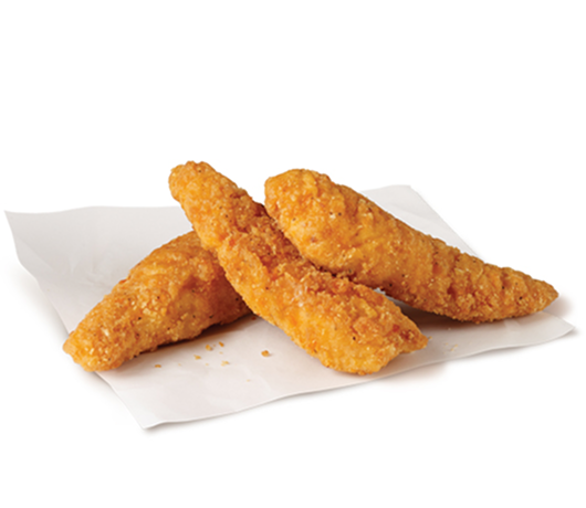 Three crispy breaded chicken tenders stacked on white parchment paper against a clean white background, showing golden texture and crunchy coating