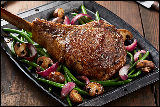 Tomahawk steak entrée in dining environment