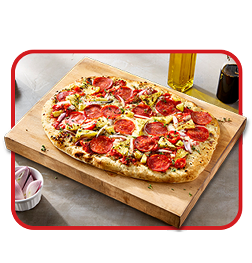 Artisanal Pepperoni and Pineapple Pizza on cutting board in restaurant setting