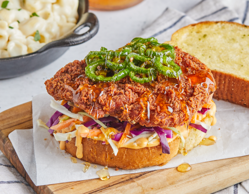 Honey jalapeño fried chicken sandwich with slaw