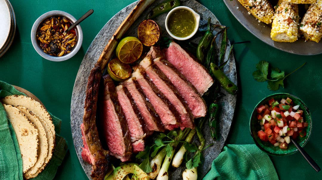 Top-down image of prepared Family Style Vaquero Beef Dinner on serving platter on table