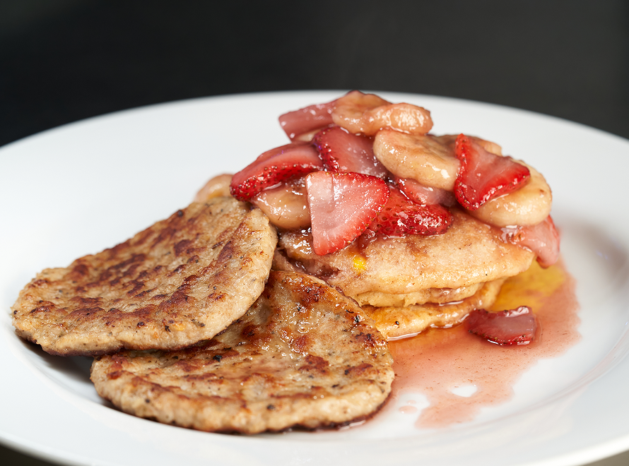 Johnny Cakes & Sausage topped with strawberry slices
