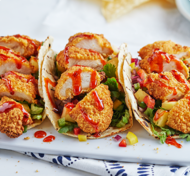 Recipe card that has an image of Hawaiian BBQ Chicken Tacos.