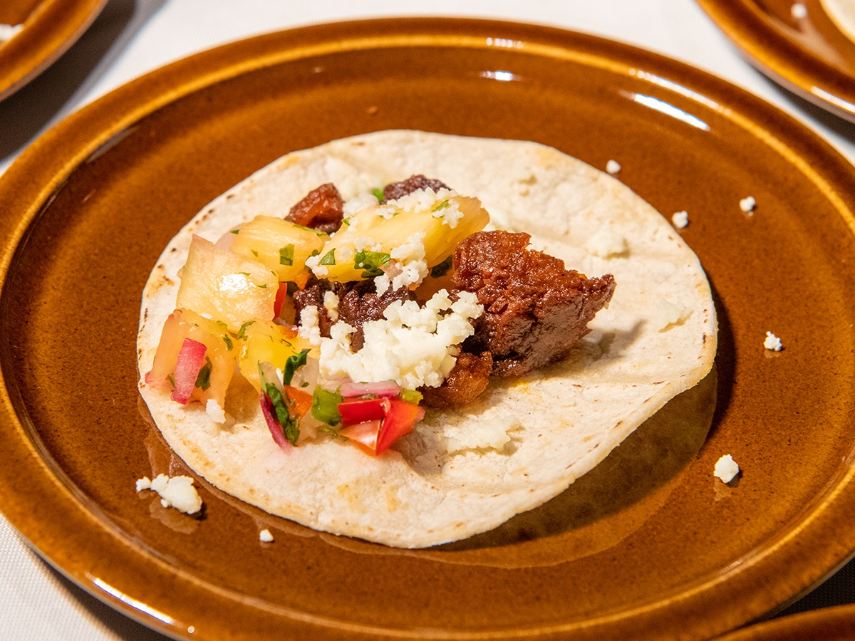 How to make a Chorizo Pina Taco using Hillshire Farm® All Natural Pork Chorizo Crumbles and using a Mexican Original® 4.5-inch Corn Flour Tortilla with a pineapple-serrano salsa. 