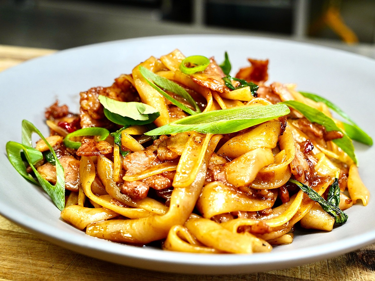 How to make the classic Drunken Noodles featuring Hillshire Farm® Sliced Pork Belly, or substitute with Hillshire Farm® Bakin’ Bacon™ Pizza Topping.