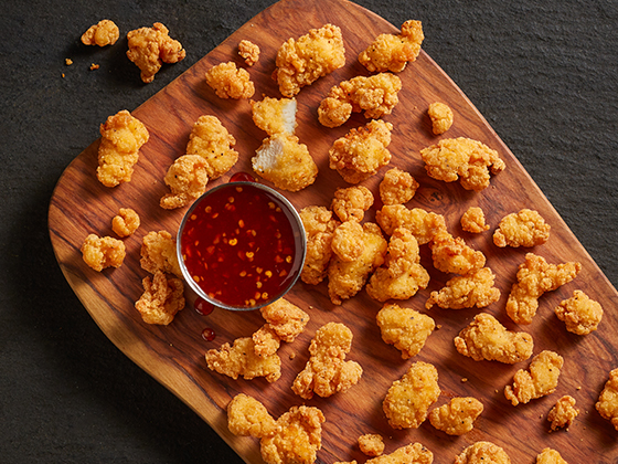Tyson® Mini Chicken Bites with a sweet and tangy Honey Sriracha Dipping Sauce