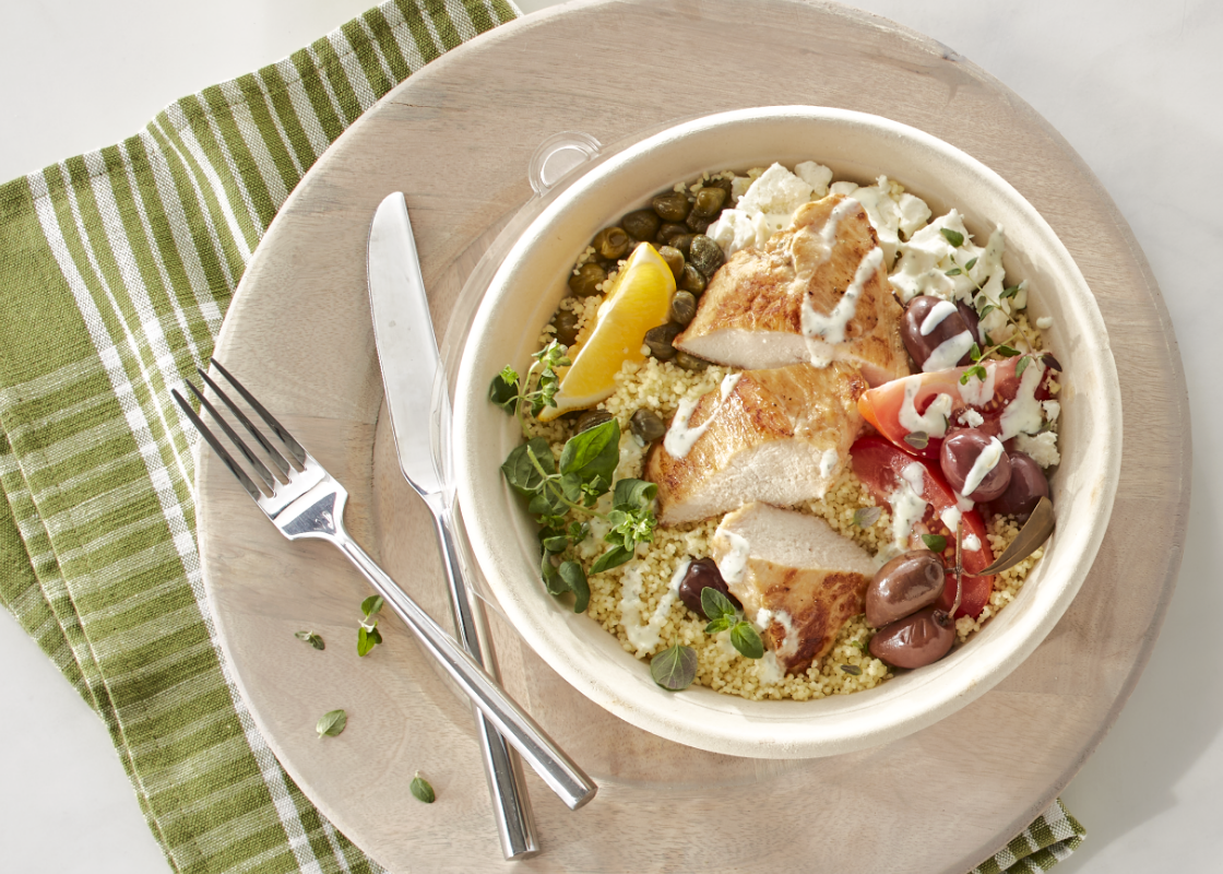 Appealing image of Tyson Red Label® Precision Cooked™ All Natural* Sous Vide Chicken Breast Filets served over couscous.