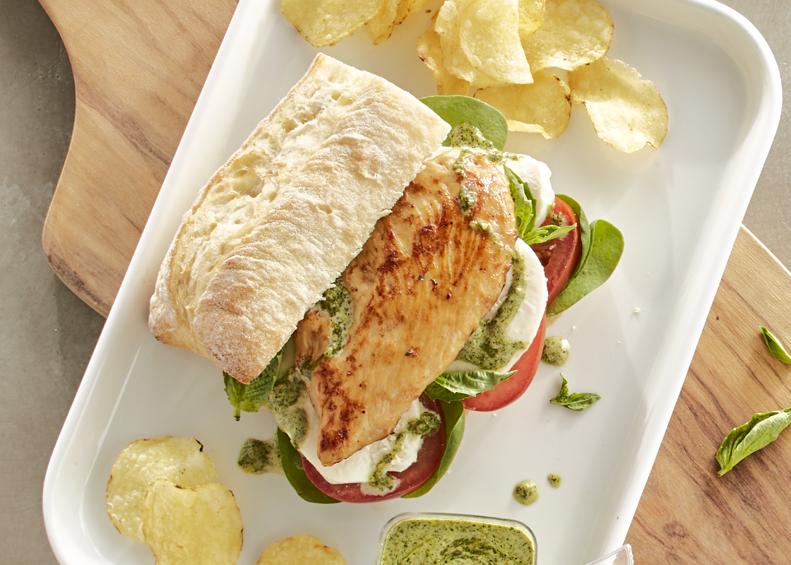 Appealing image of Tyson Red Label® Precision Cooked™ All Natural* Sous Vide Chicken Breast Filets served as part our Garden Harvest Caprese Sandwich recipe.